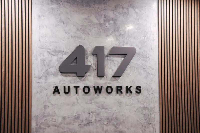 The 417 Autoworks logo on the lobby feature wall