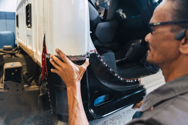 Installing fresh body-side molding on a repaired vehicle
