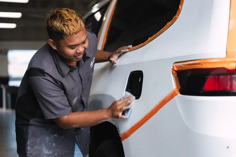 Masking off a panel before paint at 417 Autoworks