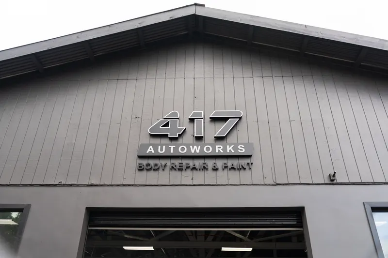 The 417 Autoworks shop front with body repair and paint signage in Wailuku