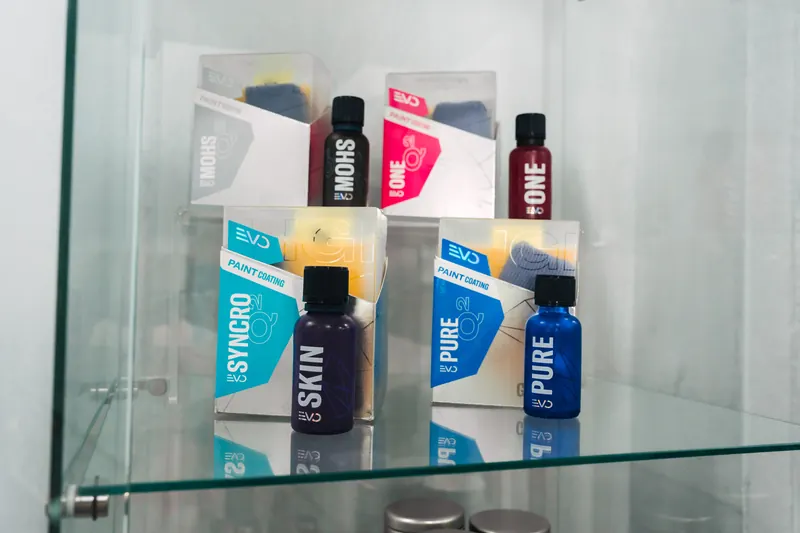Ceramic paint coating products displayed at 417 Autoworks